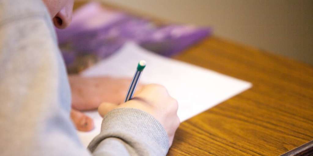 Final Exam Preparation: A focused student studying with textbooks and notes for the final exam