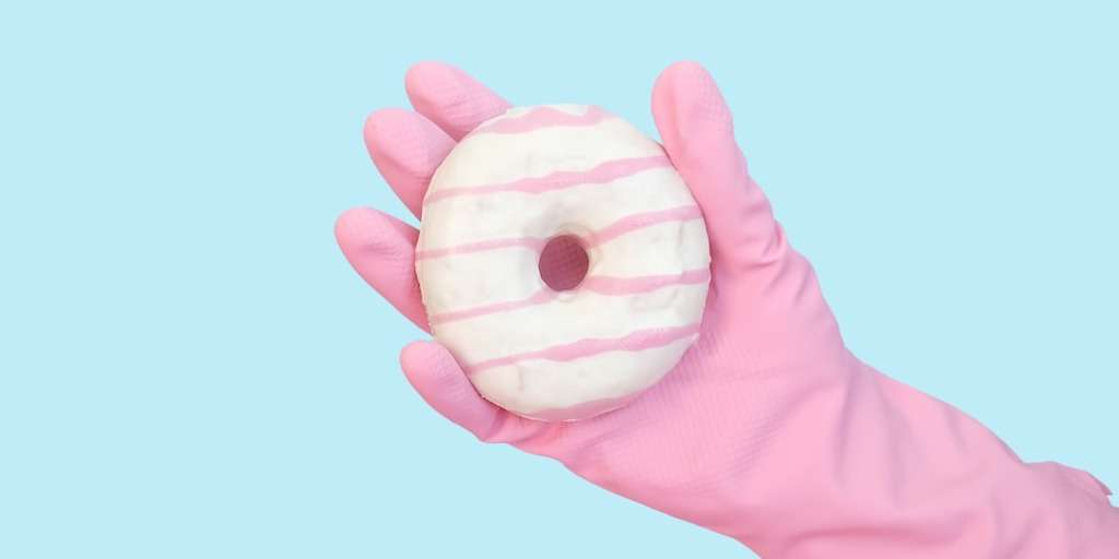 Wear Gloves When Washing Dishes.' Close-up of protective gloves being worn during dishwashing to emphasize their importance.