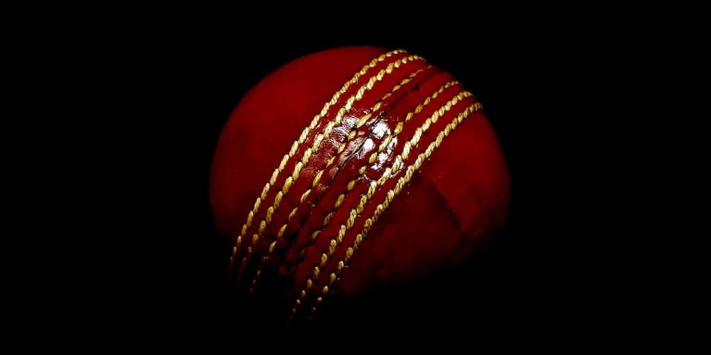 Cricket ball spinning in motion, symbolic of the India vs England Cricket World Cup showdown.